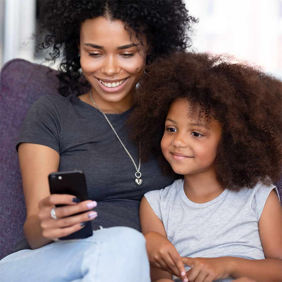 Mother and daughter contacting Sequoia Behavioral Consultants on Smartphone