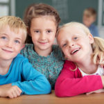 3 happy children in ABA therapy